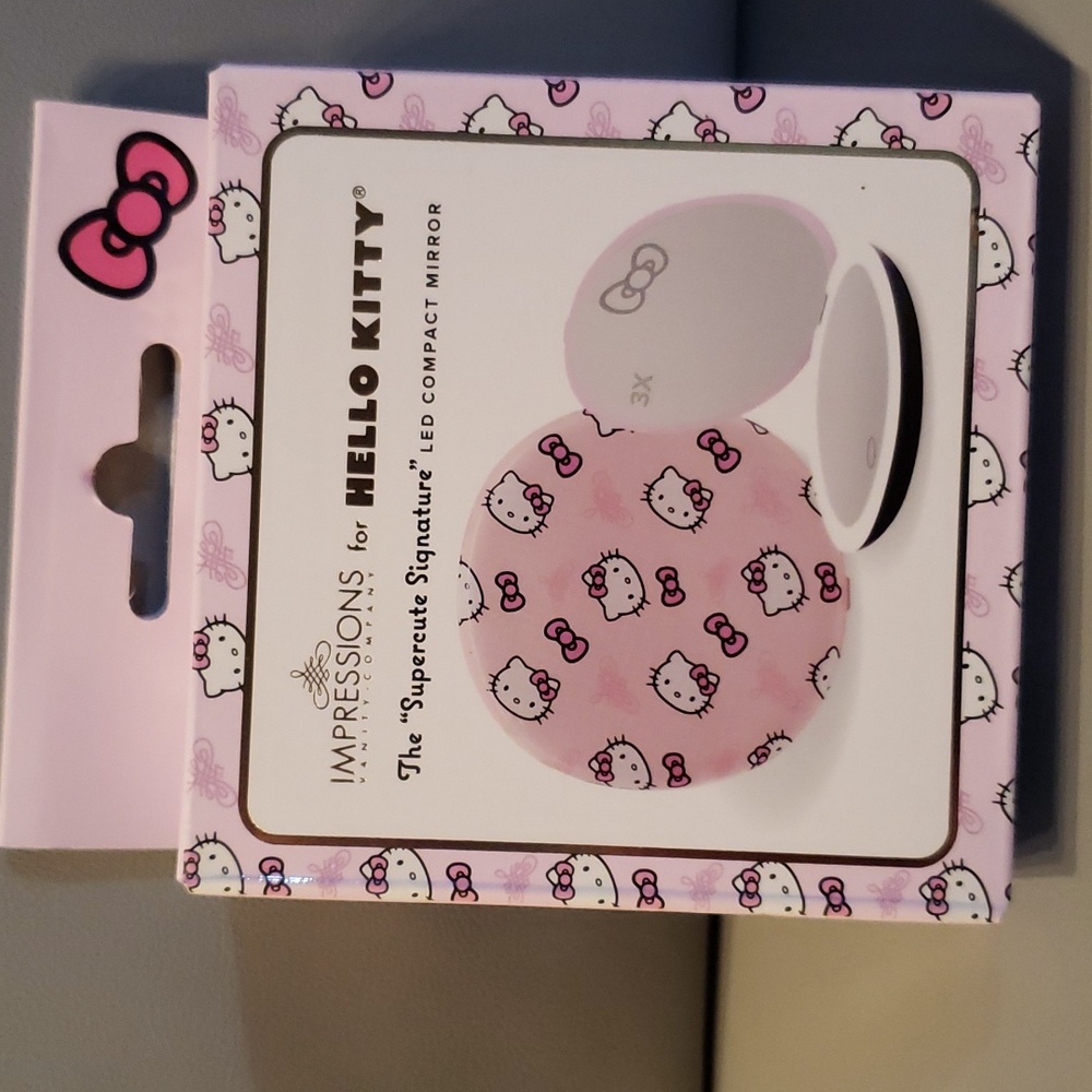 Hello Kitty pink compact mirror with 3x magnification NWT